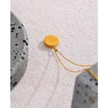 Load image into Gallery viewer, Stainless steel delicate necklace comes in a gold colour. It is made of fine and thin link chain and it has beautiful round pendant . Pendant is made of natural shell and it is circled with a fine golden border. It is also additionally adorned with small zircons which gives the necklace chic and stylish look. This necklace can be worn with any daily outfit. It has lobster clasp and adjustable length.
