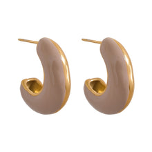 Load image into Gallery viewer, Trendy, statement earrings are made of stainless steel and come in several different colours.  One side of the earrings is coloured while the other one is in steel or gold plated colour.  The earrings are bug but light, which makes them very comfortable for wearing.  They have stud fastening.
