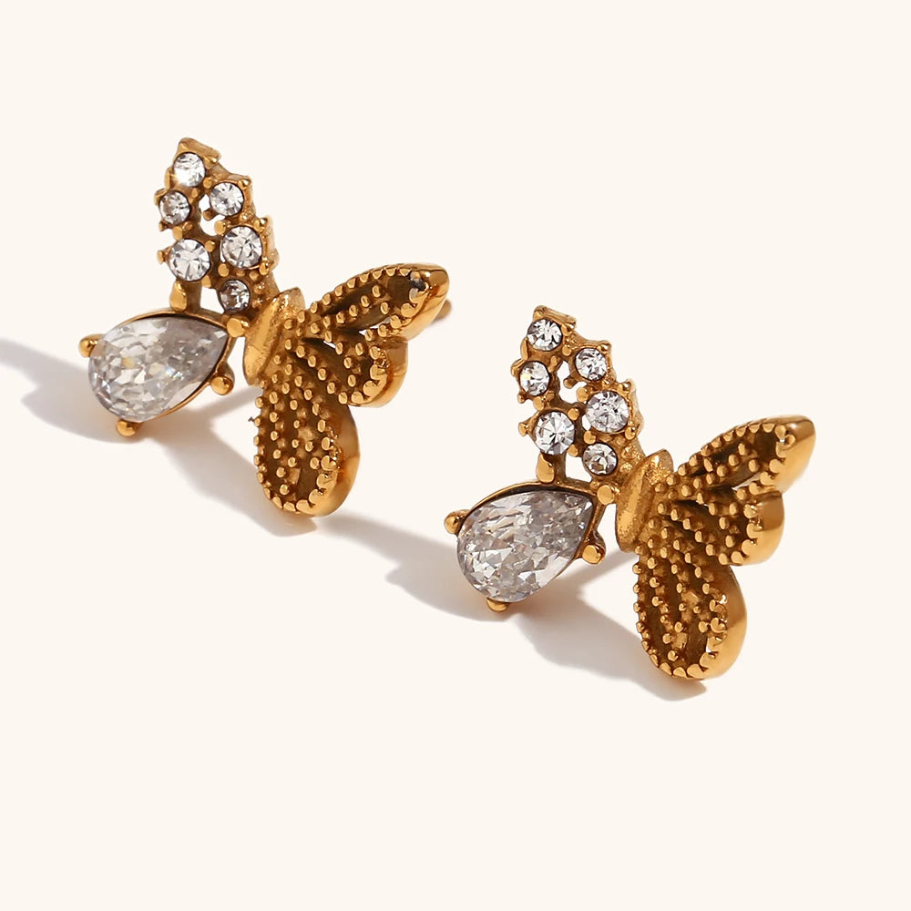 Add a touch of whimsy to your look with these asymmetric mini butterfly earrings, beautifully inlaid with sparkling zirconium. Crafted from durable stainless steel, these earrings are waterproof and perfect for daily wear. Their unique design exudes elegance and charm, making them a stylish accessory or a thoughtful gift for any occasion.