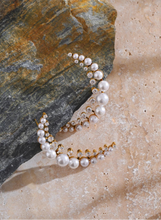 Load image into Gallery viewer, Add a touch of elegance to your look with these high-grade moon stud earrings, featuring dazzling cubic zirconia and luminous simulated pearls. Crafted from durable stainless steel, these delicate earrings offer a timeless yet modern charm, perfect for both casual and formal occasions. A stylish and sophisticated gift, they make a stunning addition to any jewelry collection.
