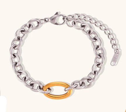 Make a bold statement with this cool 8mm thick stitching O-chain necklace, featuring a stunning silver color with a contrasting gold paperclip buckle for a modern edge. Crafted from premium stainless steel, this durable and sleek piece adds a touch of sophistication to any outfit. Perfect for layering or wearing solo, it's a versatile accessory for both casual and dressy occasions. A must-have addition to any jewelry collection!