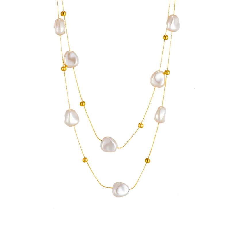 This elegant double-layer necklace combines the timeless beauty of a delicate thin stainless steel chain with the classic allure of freshwater pearls, creating a refined accessory perfect for any occasion. Its layered design adds depth and sophistication, making it an ideal choice for parties or stylish everyday wear. Crafted to last, this necklace is both chic and versatile, offering a graceful touch to any outfit and a lovely addition to any jewelry collection.