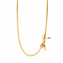 Load image into Gallery viewer, This minimalist choker necklace features a delicate knot bow design, crafted from a sleek, 18K gold-plated tiny snake chain that sits elegantly on the neck. Made from high-quality stainless steel, it combines simplicity with sophistication, making it the perfect accessory for weddings or special occasions.
