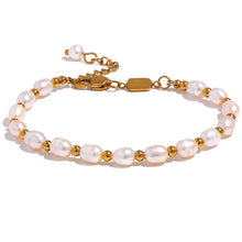 Load image into Gallery viewer, Embrace timeless elegance with this stunning natural freshwater pearl and stainless steel bead bracelet. Expertly handcrafted, this bracelet alternates lustrous freshwater pearls with polished stainless steel beads, creating a harmonious blend of classic and contemporary style. Finished with waterproof PVD coating, this durable piece is designed for everyday wear while maintaining its exquisite beauty. 
