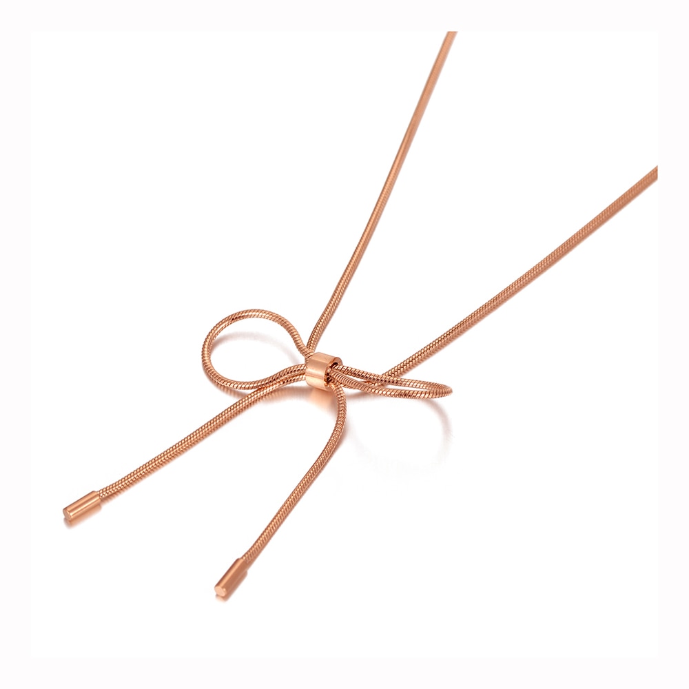 Stainless steel necklace comes in a rose gold colour. It is made of fine thin snake chain which ends with a big bowknot. The necklace is very simple, though makes a perfect accessorize to your outfit. It has lobster clasp.