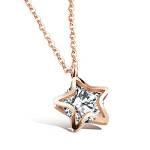 Load image into Gallery viewer, Stainless steel necklace comes in a rose gold and silver colour. It is made of fine thin chain which is adorned with a small pedant in the shape of a star. Star pedant is made of two outlines that surround cubic zirconia in the shape of a circle. The necklace is perfect for daily outfits as well as to light up your night dress. It has lobster clasp
