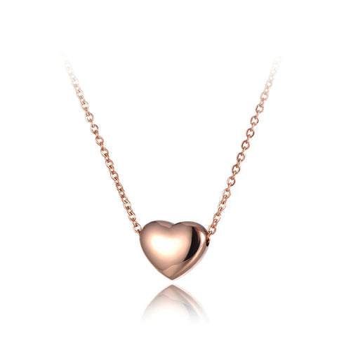 Stainless steel chain necklace comes in two colours: rose gold and silver. It is adorned with a small pedant in a shape of a heart. Simple and elegant design makes this necklace perfect for any outfit. It has adjustable length and lobster clasp.