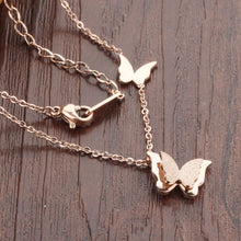 Load image into Gallery viewer, Necklace made of stainless steel comes in two variants: rose gold and silver colour. Necklace is adorned with two beautiful pedants in a shape of a butterfly. The bigger butterfly has one smaller butterfly with sanded surface. The necklace has adjustable length and lobster clasp.
