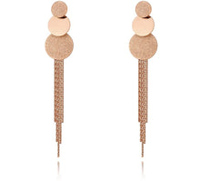 Load image into Gallery viewer, These beautiful earrings are made of stainless steel in a rose gold colour. Earrings have three circles of different sizes, from which two of them have sanded surface. Below three circles earrings are additionally adorned with stainless steel tassel. They make perfect accessory for your evening outfits. Earrings have stud closure.
