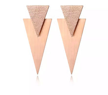 Load image into Gallery viewer, Rock glam stainless steel earrings are made in a rose gold and silver colour. They consists of  two triangles of different sizes. The upper triangle is smaller and sanded while the one situated below is bigger with shiny surface. Earrings are three times gold plated and represent perfect and elegant touch to your day to day style. They have stud fastening.
