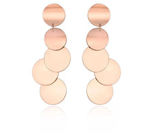 Load image into Gallery viewer, These rock glam stainless steel earrings are made in a rose gold colour. They consists of five connected circles that have shiny surface. Circles are irregularly connected which gives very special look. Earrings are rose gold plated and represent perfect and elegant touch to your day to day style. They have stud fastening.
