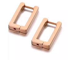 Load image into Gallery viewer, Simple stainless steel hoop earrings are made in a shape of a rectangle. They come in rose gold, gold and silver colour and make a perfect daily accessory. The surface is three times gold plated. It simple design gives you a touch of elegance and class. French lock
