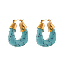 Load image into Gallery viewer, Add a pop of color to your summer look with these bold and stylish chunky resin hoop earrings! Available in vibrant blue or classic white, these lightweight hoops are crafted from durable, waterproof stainless steel for all-day wear. Perfect for vacations, beach days, or everyday outfits, they’re your new go-to statement accessory!
