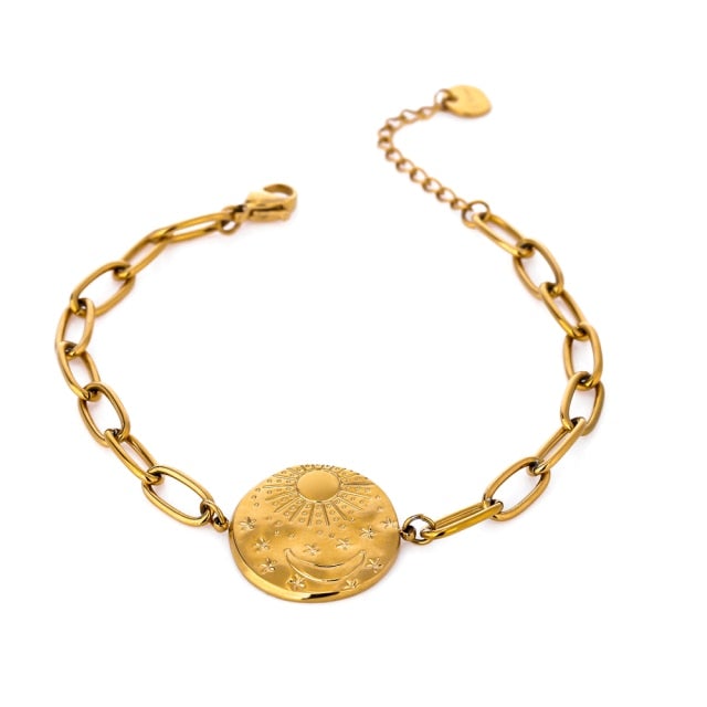 Bracelet is made of stainless steel and has real gold plating. Its link chain is adorned with medallion. Medallion has engraved sun, moon and little stars. The bracelet has adjustable length and lobster closer. It is perfect for everyday occasions. 