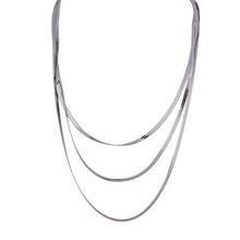 Load image into Gallery viewer, Stainless steel necklace with real gold plating comes in a gold and silver colour. It is made of a fine snake chain and it is made in three layers. Layers has different length. This snake chain necklace is perfect for glamming up your evening combination. It has lobster clasp.
