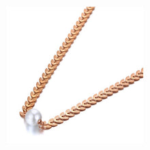 Load image into Gallery viewer, Bohemian stainless steel necklace is coming in rose gold colour and is three times gold plated. It is made of delicate and beautiful chain with links in a shape of leaves. In the bottom it is adorned with white artificial pearl. It makes great accessory for your daily and evening outfits. 
