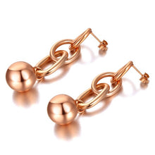 Load image into Gallery viewer, Rock glam stainless steel earrings are made in a rose gold and silver colour. They consists of three chain links. There is a ball at the bottom connected to them. Earrings are three times gold plated and represent great accessory for your rock glam styling. They have stud fastening.
