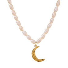 Load image into Gallery viewer, Natural pearl necklace comes in a white colour. It is made of natural pearls and it is adorned with a moon pedant. Moon is made of stainless steel and comes in a gold colour. The pedant is three times gold plated. This necklace is perfect for elegant evening outfit. It has adjustable length and lobster clasp.
