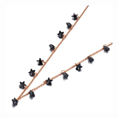 Stainless steel necklace comes in a rose gold and silver colour. it is three times gold plated. The necklace is made of fine thin chain which is adorned with fourteen little pedants in a shape of a star. Star pedants are made in black colour. This elegant bohemian necklace is perfect to spice up any outfit. It has lobster clasp.