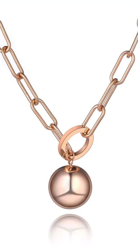 Stainless steel hip-hop/rock style necklace comes in a rose gold and silver colour. It consists of big chain links and it is adorned with big statement round ball pedant. It is a perfect accessory for your rock glam outfit. 